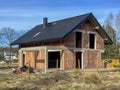 A single-family house built of ceramic blocks with a tile roof in a shell state Royalty Free Stock Photo