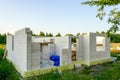 Single family house construction site, wall construction from concrete blocks, foundation insulation Royalty Free Stock Photo