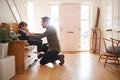 Single Father At Home Getting Son Wearing Uniform Ready For First Day Of School Royalty Free Stock Photo