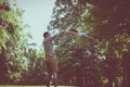 Single father playing in the meadow with daughter. Royalty Free Stock Photo