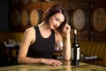 Single female alone at restaurant bar drinking wine alone seductive flirt Royalty Free Stock Photo