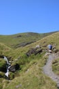 Walker on stony footpath by Scales Beck Blencathra Royalty Free Stock Photo