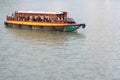 A single ferry boat on a river