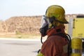 Single fireman in fire fighting protection suit Royalty Free Stock Photo