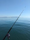 Single fishing rod on the boat looking towards Isle of Wight