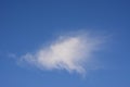 Single fluffy cloud on blue sky Royalty Free Stock Photo