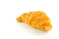 Single fresh croissant, casting soft shadow.