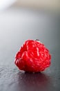 Single fresh juicy wet rapsberry Royalty Free Stock Photo