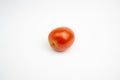 single fresh red tomato. isolated on white background Royalty Free Stock Photo