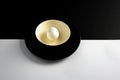 Single fresh white egg on a yellow bowl Royalty Free Stock Photo