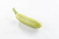 Single fresh whole green zucchini isolated on white background with shadow Royalty Free Stock Photo