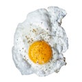 Single fried egg sprinkled with ground black pepper isolated on Royalty Free Stock Photo