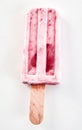 Single frozen iced fresh strawberry popsicle