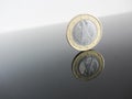 Single German Euro coins on grey background Royalty Free Stock Photo