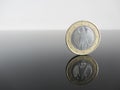 Single German Euro coins on grey background Royalty Free Stock Photo