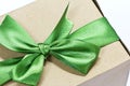 Single gift box with green ribbon