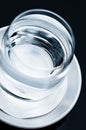 Single glass of clean clear drinking water close up macro on the table Royalty Free Stock Photo