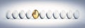 Single golden Egg in a  Row of white Eggs Royalty Free Stock Photo