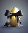 Single golden painted easter egg with bow