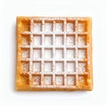 Golden waffle adorned with powdered sugar showcasing its grid-like pattern on white background Royalty Free Stock Photo