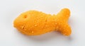 A single goldfish cracker on a plain white background shot Royalty Free Stock Photo