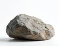 Single gray stone isolated on white studio background. Natural mineral rock solid heavy form with rough porous texture. Boulder Royalty Free Stock Photo