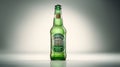 A single green beer bottle is displayed on a white background Royalty Free Stock Photo