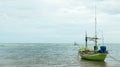 Single Green Fishing Boat Floating on The Sea in The Morning Waiting to Sail in The Ocean for Start Fishing by The Fisherman