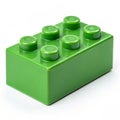 Single green building block with six studs on a white background plastic game Royalty Free Stock Photo