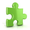 Single, green, standing jigsaw puzzle piece. Usual angle