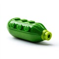 Green Lego Toy Shaped Like A Pickle With Four Studs Against White Background Royalty Free Stock Photo