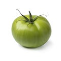 Single green unripe tomato