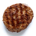 Single grilled hamburger patty on white from above.