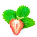 Single half cut strawberry and leaves isolated on a white Royalty Free Stock Photo