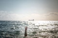 Single hand of drowning man in sea asking for help Royalty Free Stock Photo