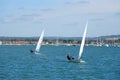 Single handed sailing dinghies on open water