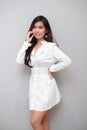 Asian girl with nice outfit, wearing a long sleeves dress Royalty Free Stock Photo