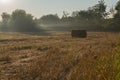 Single Hay Bale In Field Early Morning Sun Rising Royalty Free Stock Photo