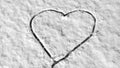 Single heart on snow romantic wintertime background Royalty Free Stock Photo