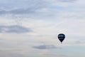 Single hot air balloon against a beautiful summer sky Royalty Free Stock Photo