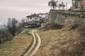 Single house dirty road and truck traces Royalty Free Stock Photo