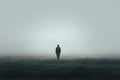 Single human silhouette standing in fog, concept of loneliness and isolation Royalty Free Stock Photo