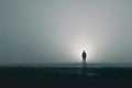 Single human silhouette standing in fog, concept of loneliness and isolation Royalty Free Stock Photo