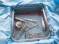 single instrument tray contains various surgical instruments