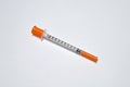 Single insulin syringe isolated on white Royalty Free Stock Photo