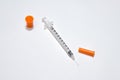 Single insulin syringe isolated on white Royalty Free Stock Photo