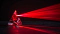 Red Laser Beam Refracting Through a Crystal Prism Royalty Free Stock Photo