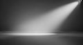 Dramatic spotlight illuminating a textured stage floor with subtle reflections Royalty Free Stock Photo