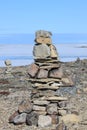 A single Inukshuk Inuksuk near the community of Igloolik, Nunavut