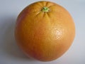 Single juicy orange on a white background